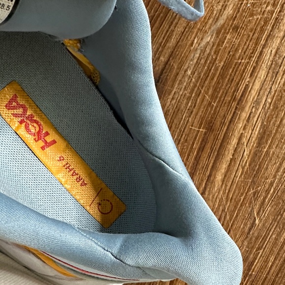 Hoka Pale Blue Running Shoes with Yellow and Red Accents - Picture 12 of 16